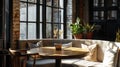 a banquette nook with black windows and a wooden round dining table, inspired by studio aesthetics, the cozy ambiance