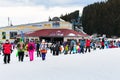 Bansko ski resort, ski lift and people on slope, Bulgaria