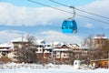 Bansko cable car cabin and houses, Bulgaria Royalty Free Stock Photo