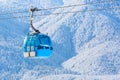 Bansko cable car cabin and snow peaks, Bulgaria