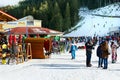 Bansko ski resort, ski lift and people on slope, Bulgaria