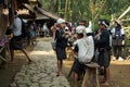 Inner Baduy tribe children are buying snacks before continuing their journey to their traditional village