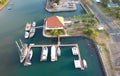 Banyuwangi, Indonesia - August 22, 2022: Drone View of the yachts docks around the Boom marina