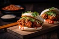 bao bun with fried chicken, spicy sauce and green onion