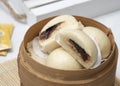 Baozi or Bakpao is a type of yeast-leavened filled bun in various Chinese cuisine Royalty Free Stock Photo