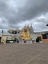 BAPS Shri Swaminarayan Mandir - with gilded Buddha and ornate elephant