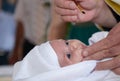 Baptism anointing baby