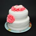 Baptism cake - two tier white fondant cake Royalty Free Stock Photo