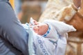 Baptism of a child in the Church, the process of anointing, baptism Christening the baby at the Orthodox church