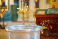 A baptismal font is a special baptismal vessel used in the Orthodox church