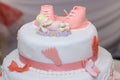 Baptize cake with sugar shoes