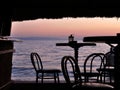 Silhouette of bar chairs and tables in the tropica Royalty Free Stock Photo