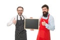 Bar cafe staff. Hiring staff. Men bearded hipster informing you. Men bearded bartender or cook in apron hold blank