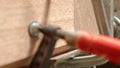 Bar clamp on wood, closeup