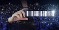 Bar Code Price Tag Merchandise Concept. Hand hold digital hologram Bar Code Price Tag sign on city dark blurred background. Royalty Free Stock Photo