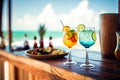 Bar counter on the beach. Glasses with cocktails lie on the table. Concept of relaxing, summer vacation. Generative AI. Royalty Free Stock Photo
