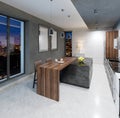 Bar counter with chairs in the kitchen in contemporary style