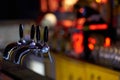 Bar counter with filling taps for beer and alcoholic beverages. Royalty Free Stock Photo