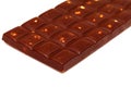 A bar of dark chocolate with hazelnuts Royalty Free Stock Photo