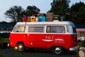 Cute red Volkswagen Westfalia Camper sign for the Salt Cottages at 20 ME-3 seen at dawn Royalty Free Stock Photo