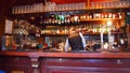 Victorian Pub interior with barman in Manchester, Northern England
