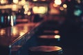 Bar interior with glowing lights and empty stools Royalty Free Stock Photo