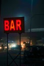 Bar light sign board in red color, neon sign for a bar,Bar neon sign,neon BAR sign lights up the doorway of a drinking