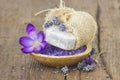 Bar of natural soap, bath salt, dried lavender and crocus Royalty Free Stock Photo