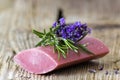 Bar of natural soap, lavender flowers and rosemary Royalty Free Stock Photo