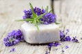 Bar of natural soap and lavender flowers Royalty Free Stock Photo