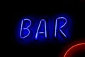 BAR neon sign with red curve