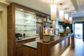 Bar with a nice counter and glass shelves