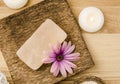 Bar of orange dry Himalayan crystal Salt Soap on wooden background. Royalty Free Stock Photo