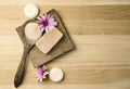 Bar of orange dry Himalayan crystal Salt Soap on wooden background with wooden spoon with pink orange Himalayan crystal Salt grain Royalty Free Stock Photo