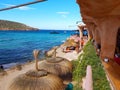 The bar restaurant and bazaar in cala comte nestled in the cliff rock Royalty Free Stock Photo