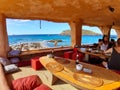 The bar restaurant and bazaar in cala comte nestled in the cliff rock Royalty Free Stock Photo