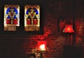 Bar scene, lustres in red and glass stained window Royalty Free Stock Photo