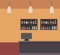 Bar shop counter computer lamps and shelf bottles Royalty Free Stock Photo