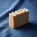 Bar of soap with an uneven, textured surface, featuring small Royalty Free Stock Photo