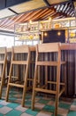 bar stools or benches, with thick pasta floor, at the back vegetation, bar and counter bar. Royalty Free Stock Photo