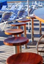 Bar stools on ship deck Royalty Free Stock Photo