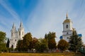 St. Anna Roman Catholic Church, Christian temple in Neo Gothic style and Dormition of the Mother of God modern russian Orthodox