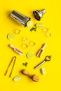 Bar utensils and tools for Mojito cocktail - shaker, lime and ice Royalty Free Stock Photo