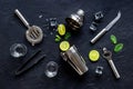 Bar utensils and tools for Mojito cocktail - shaker, lime and ice Royalty Free Stock Photo