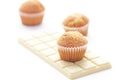 Bar of white chocolate and muffin Royalty Free Stock Photo