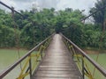 Barabai, Indonesia. February 18, 2023 : Suspension bridge as an emergency bridge to help post-flood residents& x27; activities