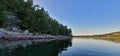 Baraboo quartzite tumbled rocks on lakeshore Devils lake state park by kayak Royalty Free Stock Photo