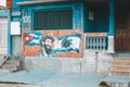 Graffiti and wall painting representing the Cuban national hero Camilo Cienfuegos, Baracoa, Cuba