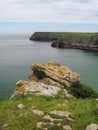 Barafundle Bay looking out to natural sea arches, Stackpole, Pembrokeshire Wales Royalty Free Stock Photo