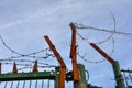 Barbed wire on a rusted iron gate Royalty Free Stock Photo